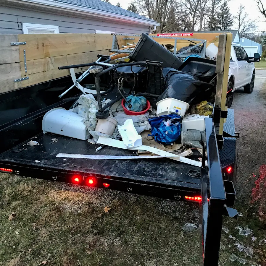 Roll-off dumpster delivered to a residential driveway in Mahomet